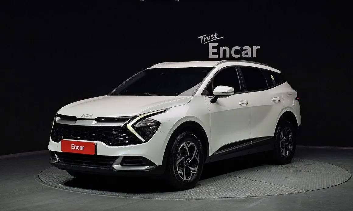 Kia Sportage — фото 1