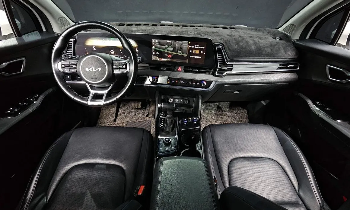 Kia Sportage — фото 8