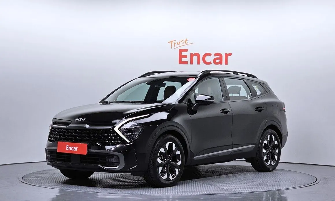 Kia Sportage — фото 1