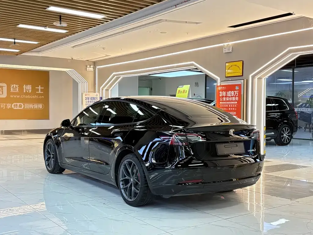 Tesla Model 3 — фото 9