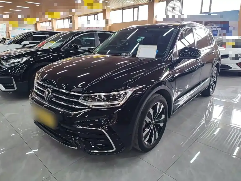 Volkswagen Tiguan L — фото 7