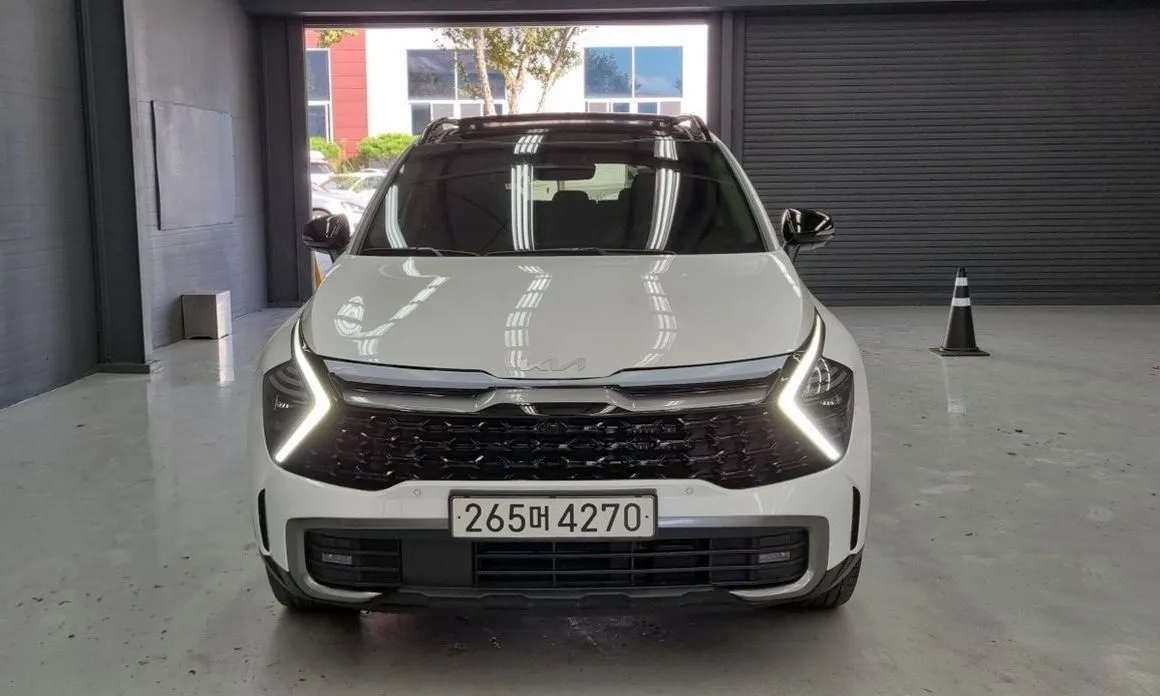 Kia Sportage — фото 1