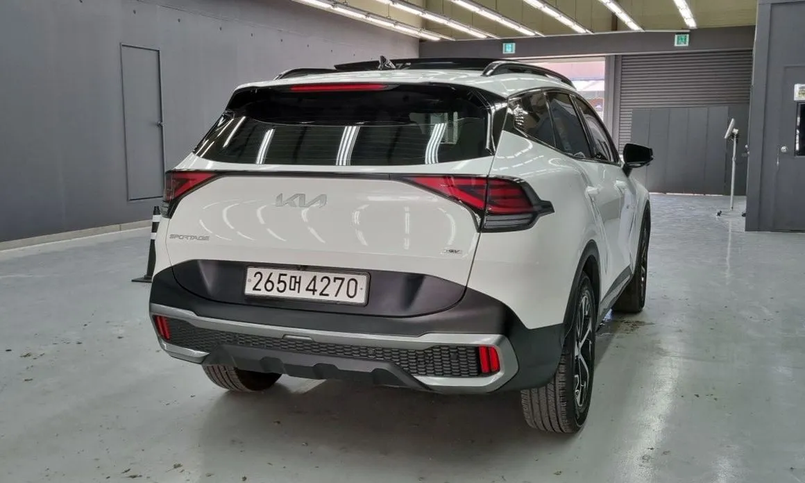 Kia Sportage — фото 7