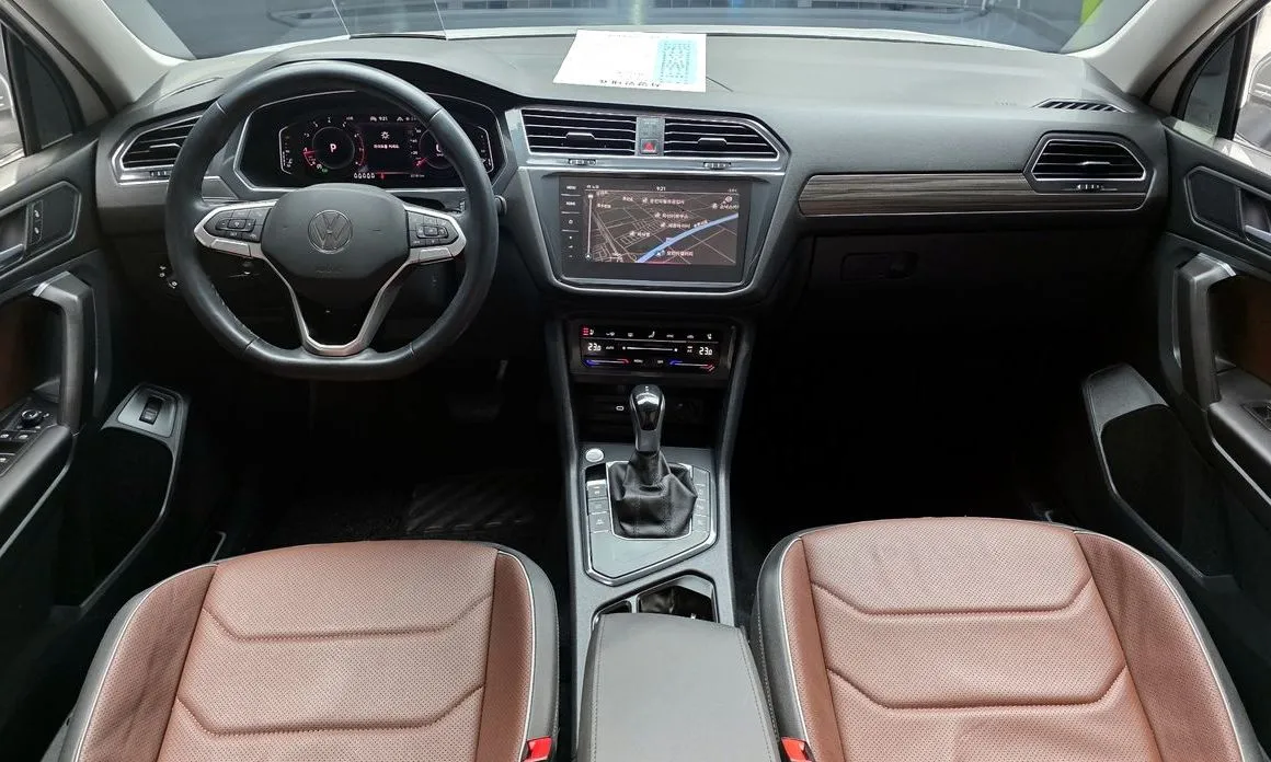 Volkswagen Tiguan — фото 10