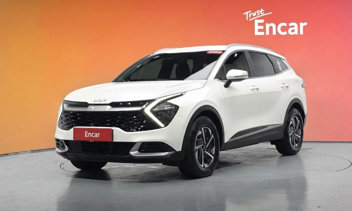 Kia Sportage — фото 1