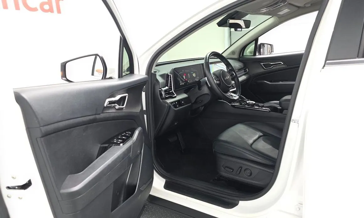Kia Sportage — фото 7