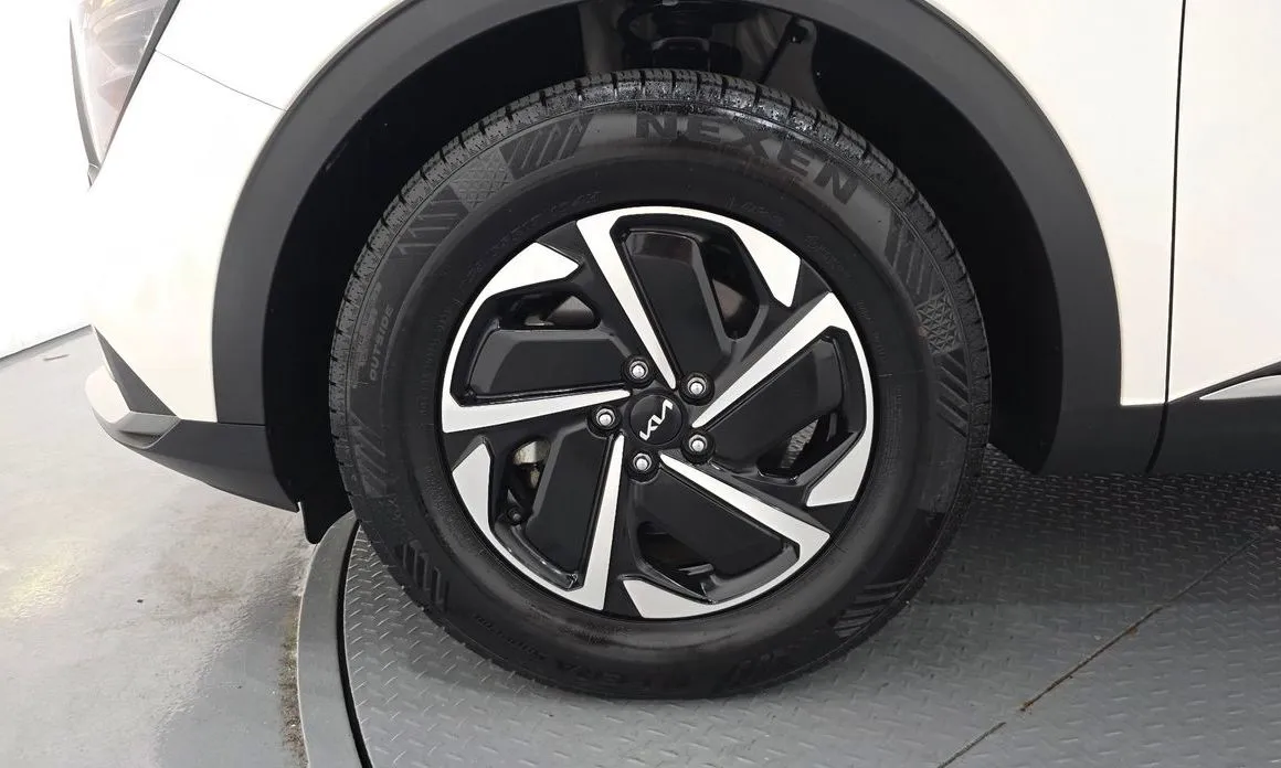 Kia Sportage — фото 10