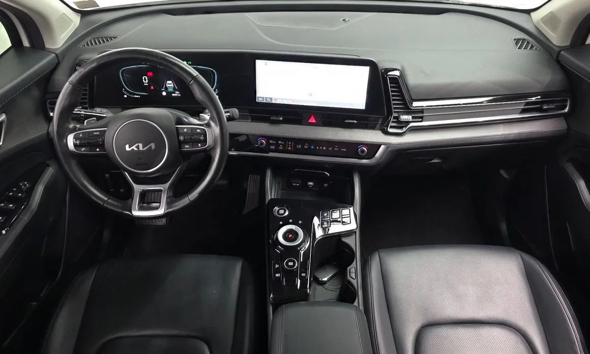 Kia Sportage — фото 9