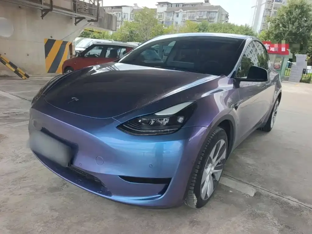 Tesla Model Y — фото 10