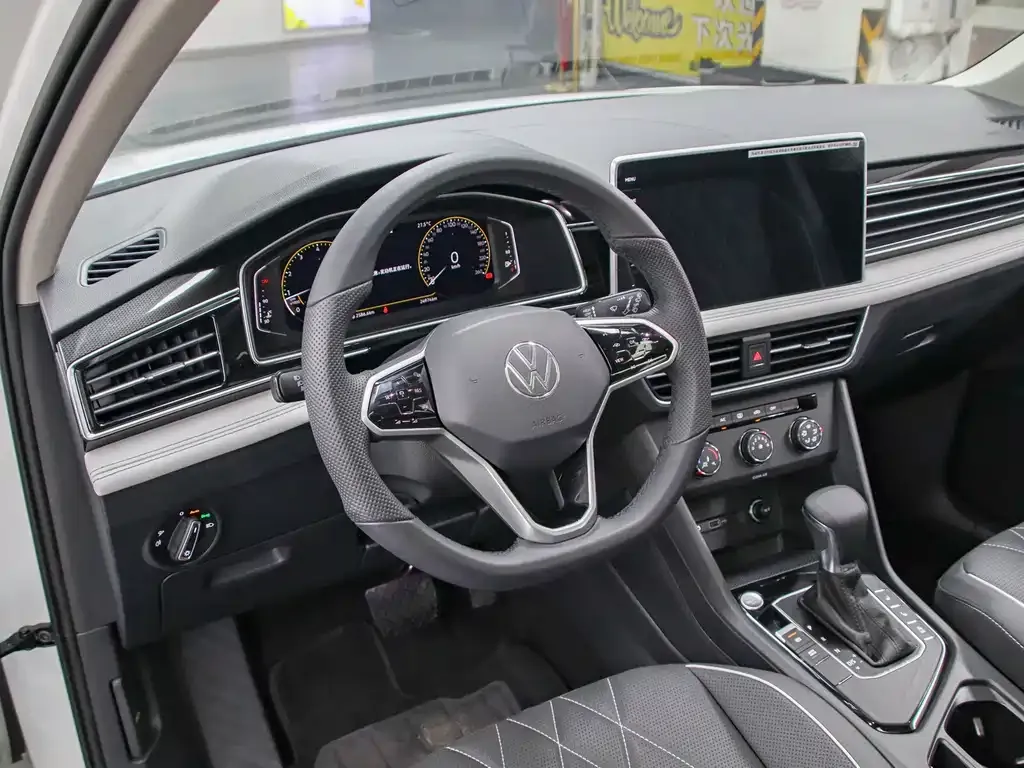 Volkswagen Tiguan L — фото 4