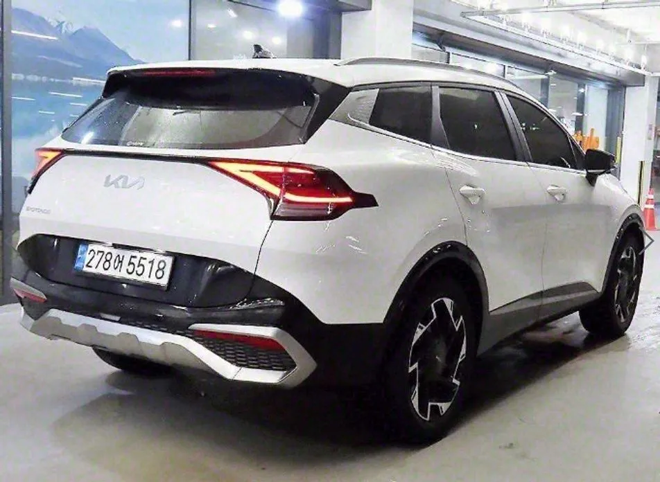 Kia Sportage — фото 7