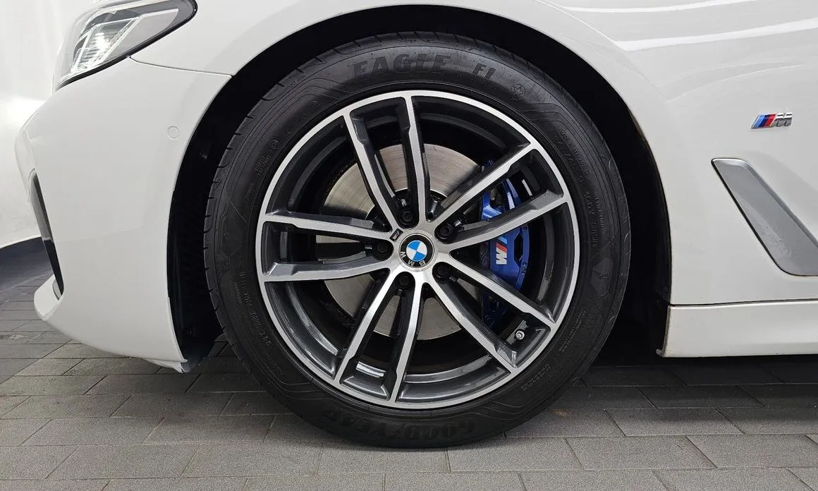 BMW 5-Series — фото 10