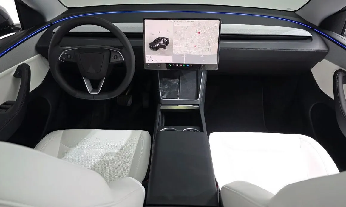 Tesla Model Y — фото 10
