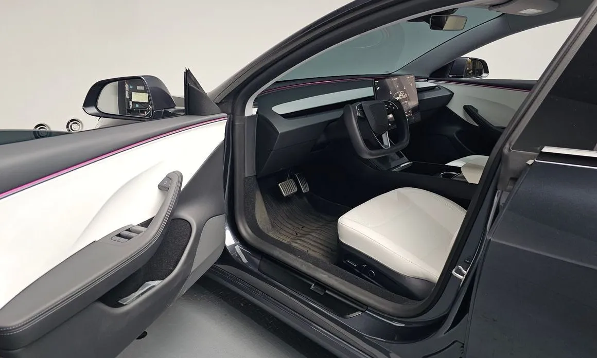 Tesla Model 3 — фото 9