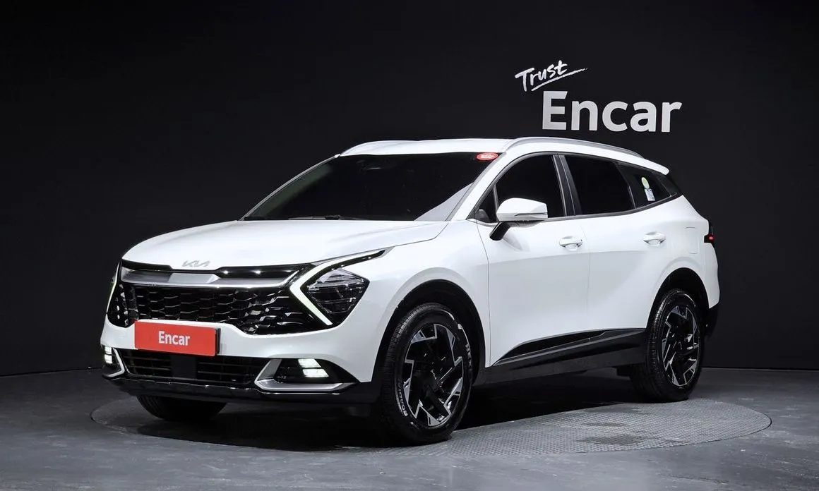 Kia Sportage — фото 1