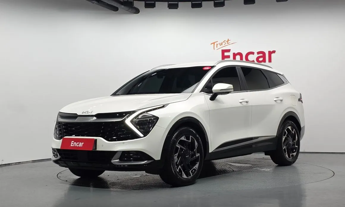 Kia Sportage — фото 1