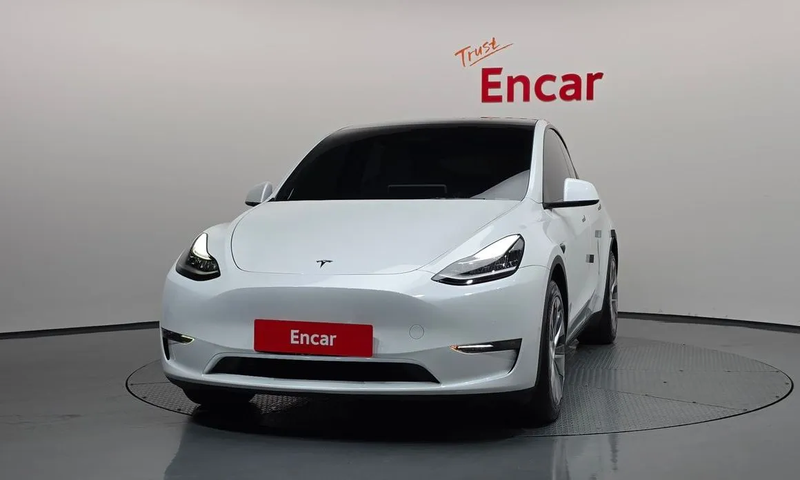 Tesla Model Y — фото 9