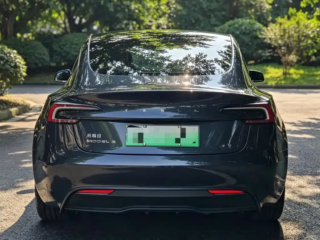 Tesla Model 3 — фото 6
