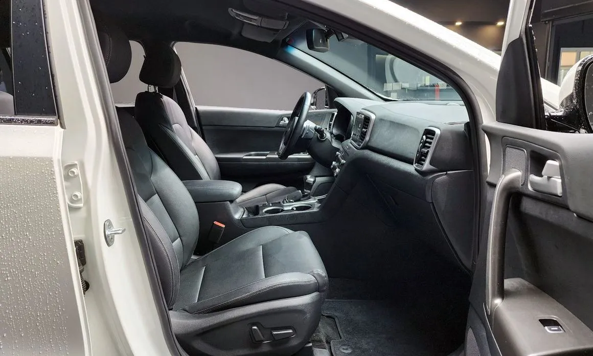 Kia Sportage — фото 7