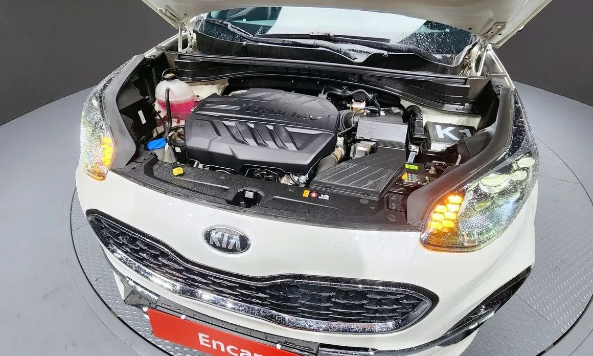 Kia Sportage — фото 10
