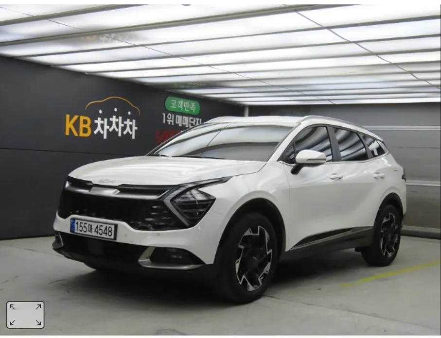 Kia Sportage — фото 1