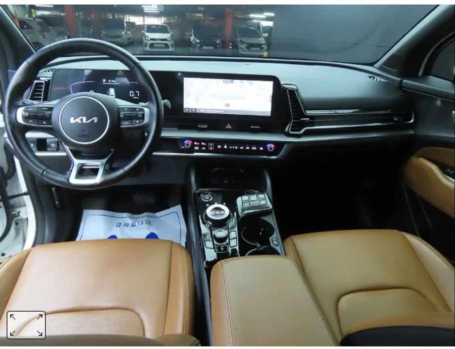 Kia Sportage — фото 10