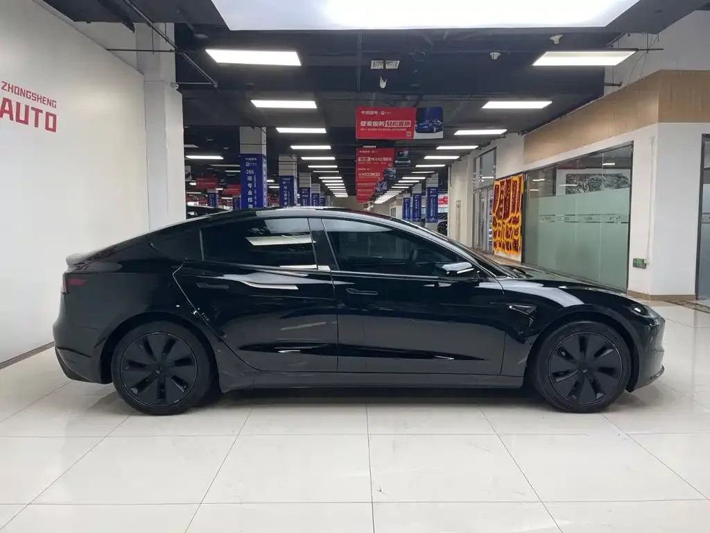 Tesla Model 3 — фото 7