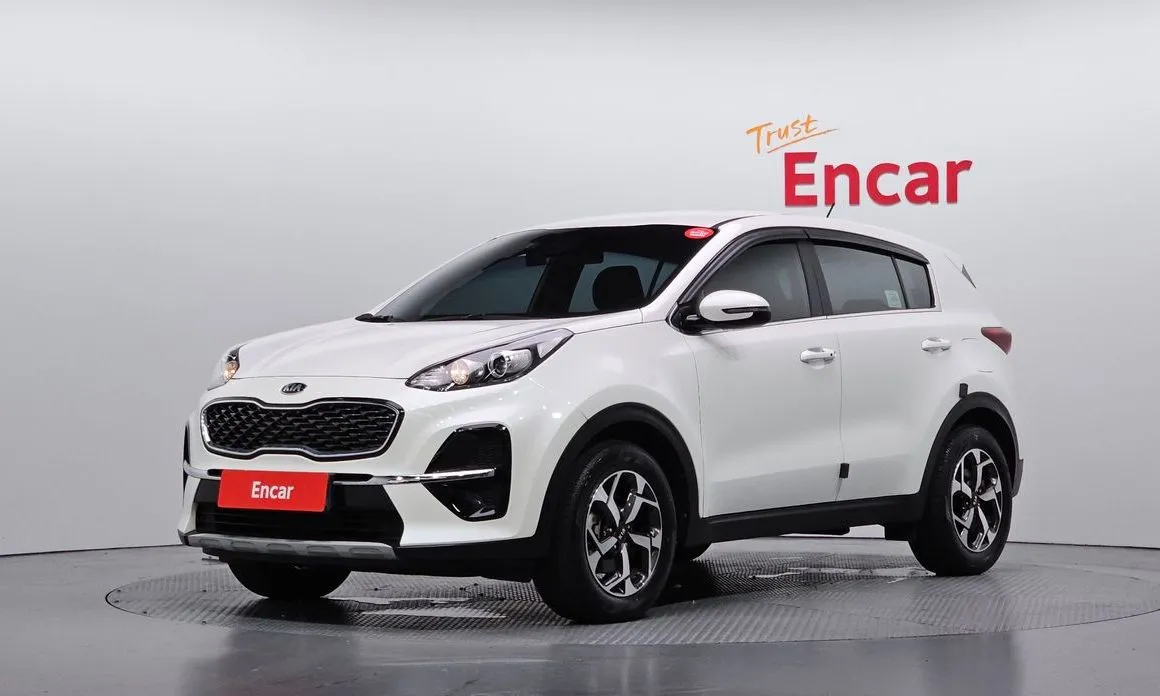 Kia Sportage — фото 1