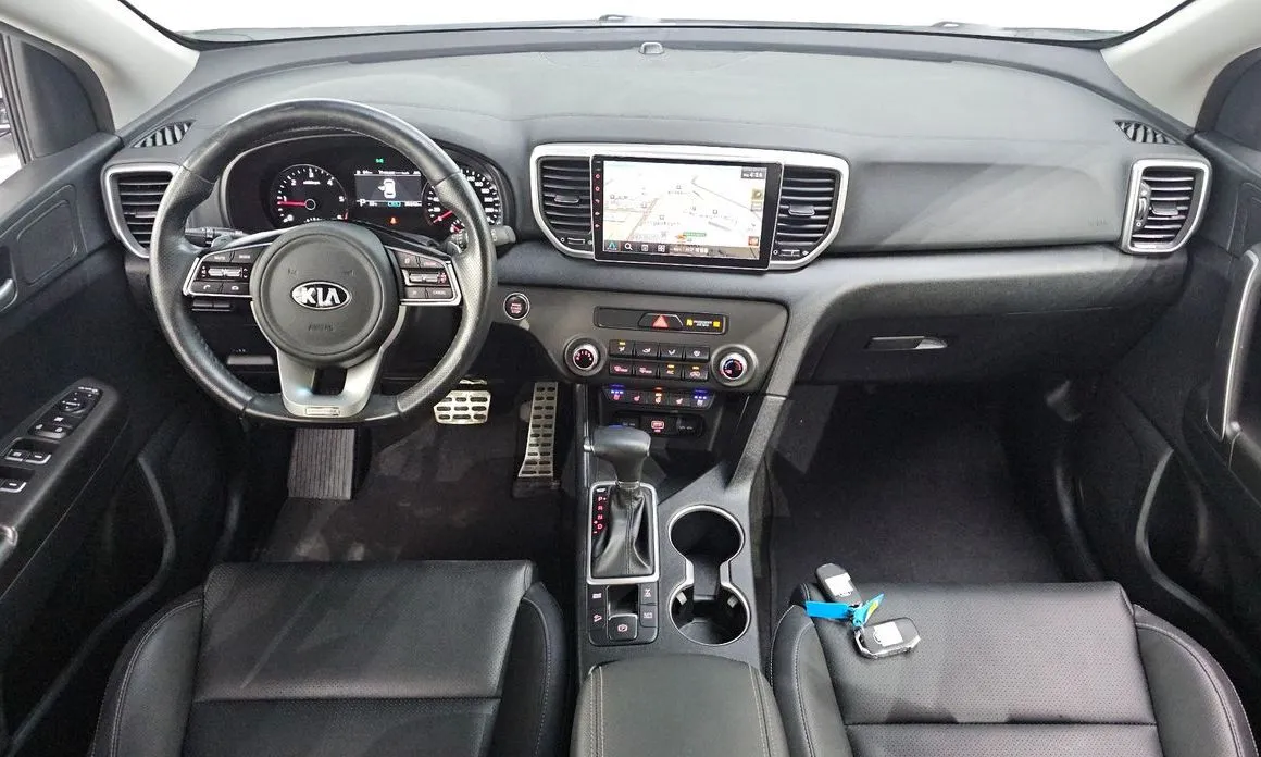 Kia Sportage — фото 7