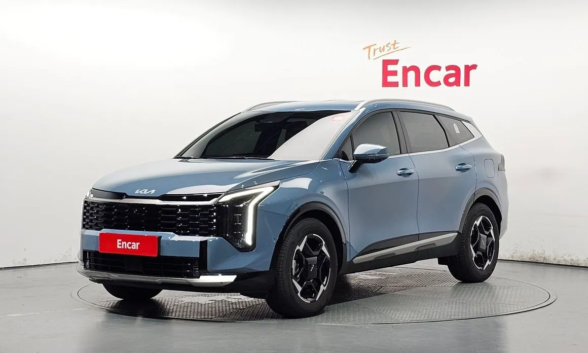 Kia Sportage — фото 1