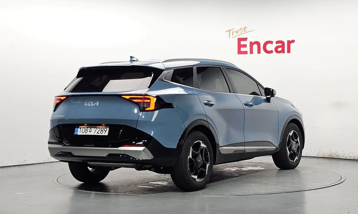 Kia Sportage — фото 7