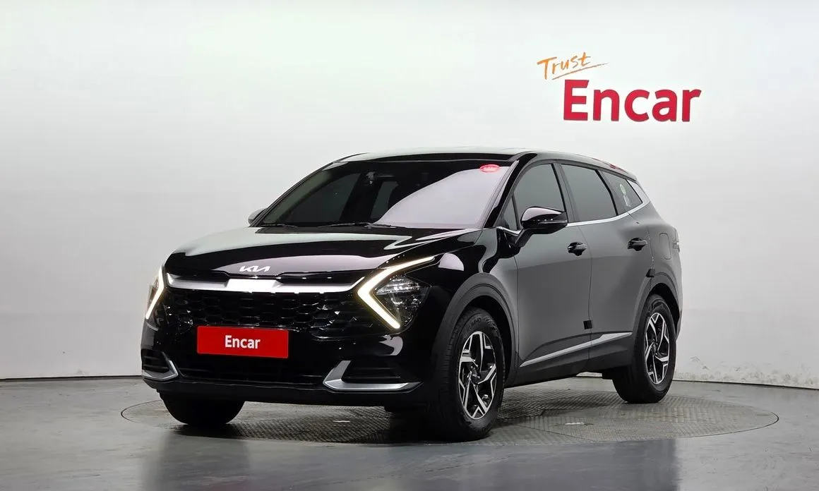 Kia Sportage — фото 1