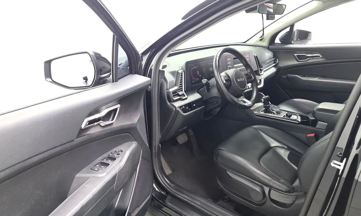 Kia Sportage — фото 10