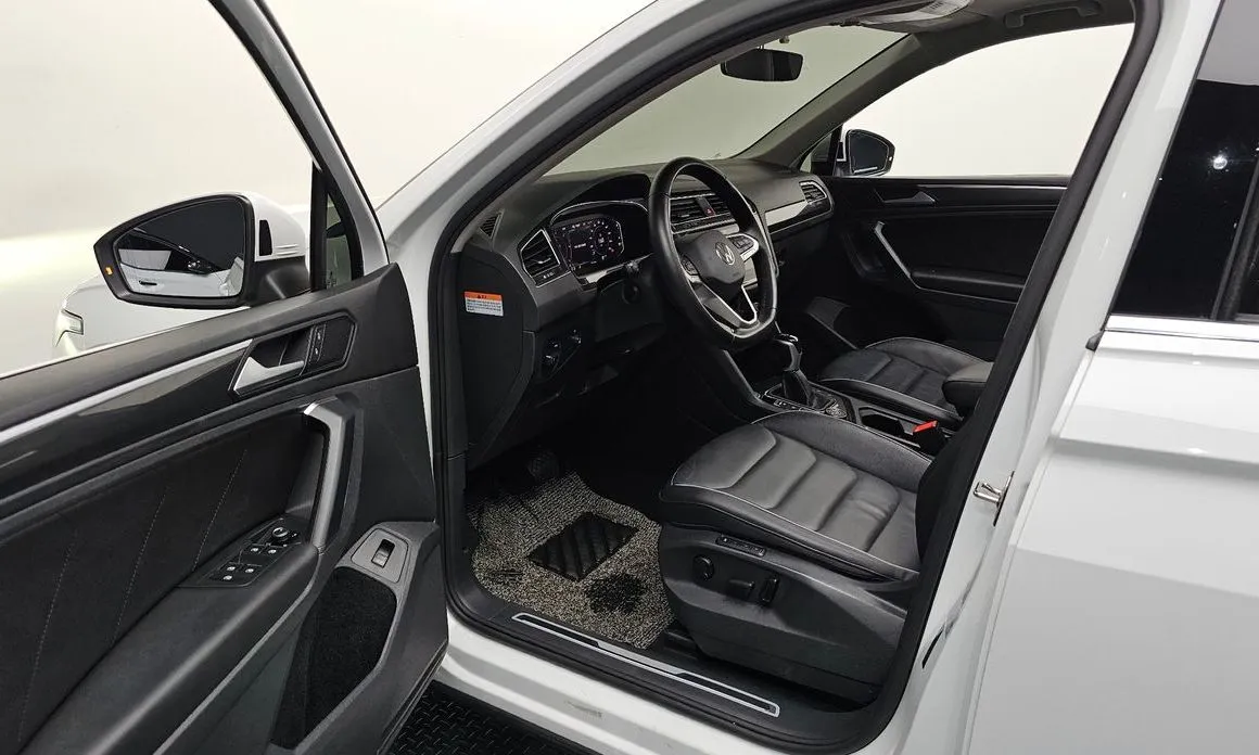 Volkswagen Tiguan — фото 9