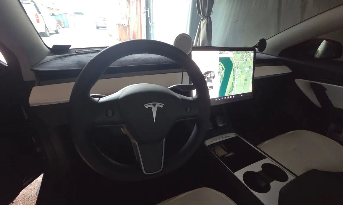 Tesla Model 3 — фото 7