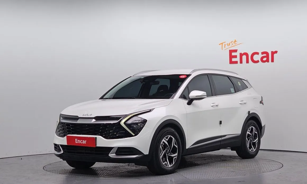 Kia Sportage — фото 1