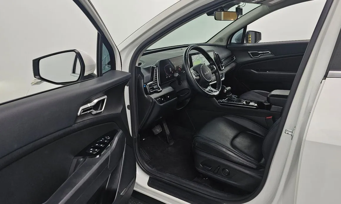 Kia Sportage — фото 9