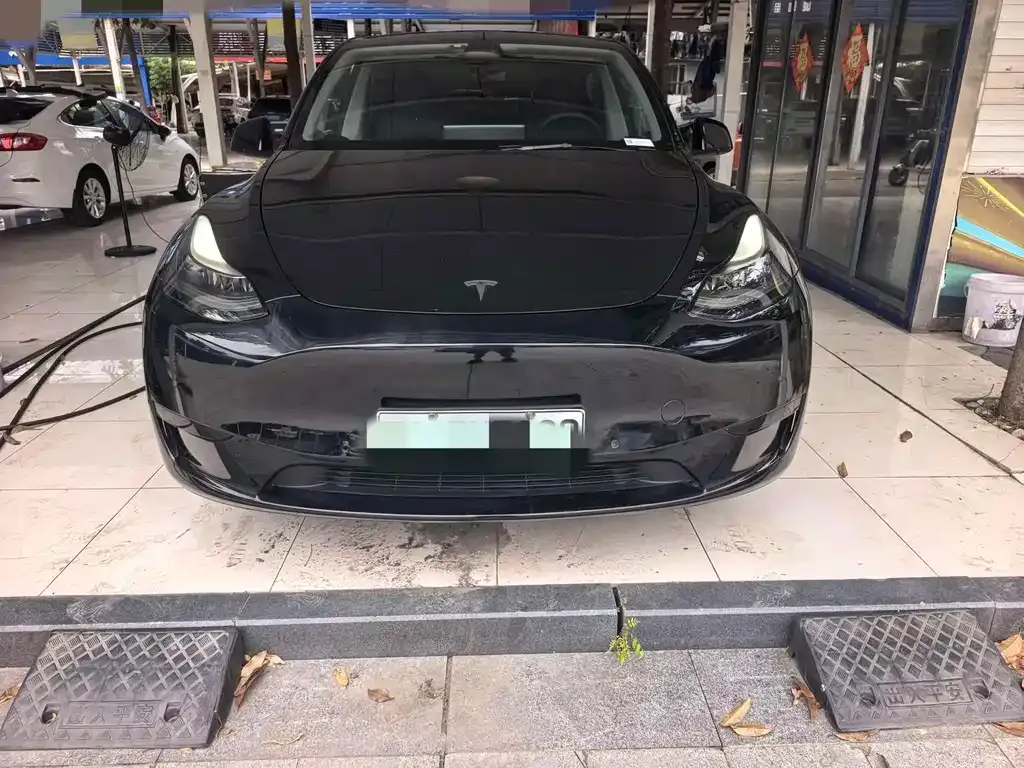 Tesla Model Y — фото 7
