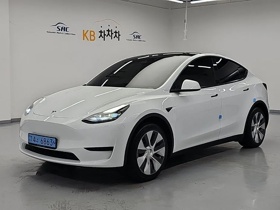 Tesla Model Y — фото 1