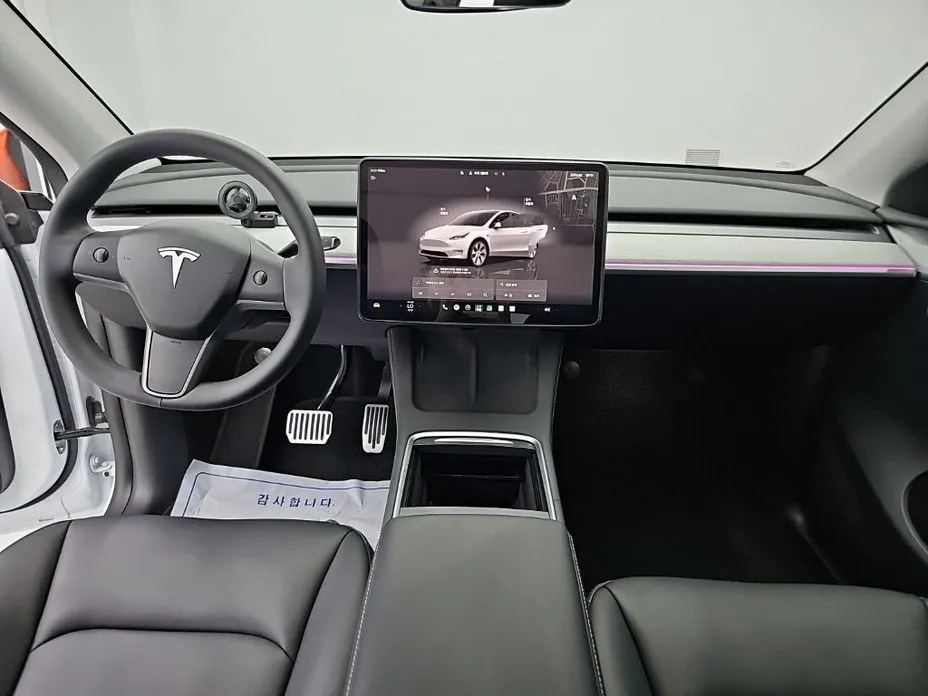 Tesla Model Y — фото 6