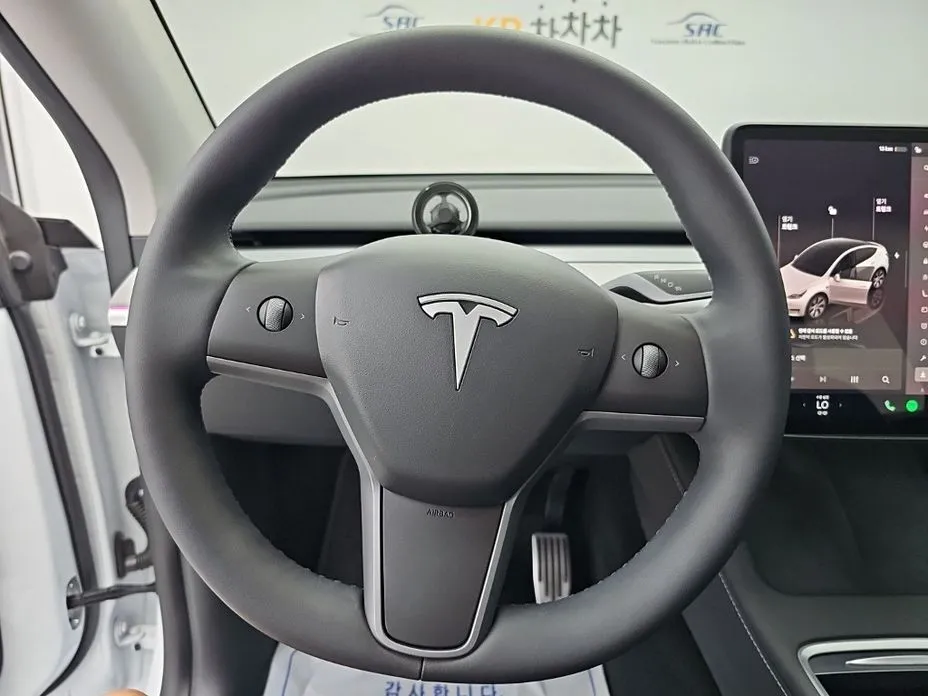 Tesla Model Y — фото 8