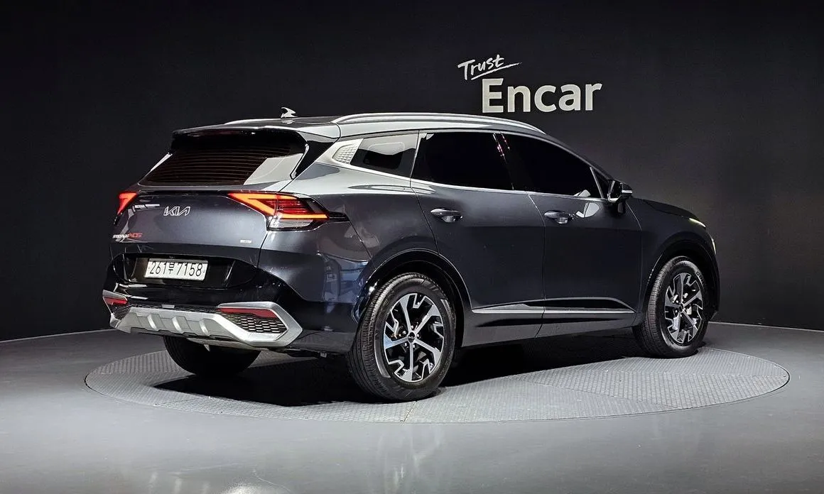 Kia Sportage — фото 9