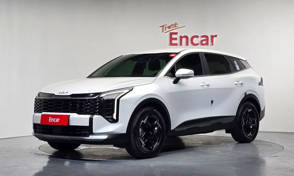 Kia Sportage — фото 1