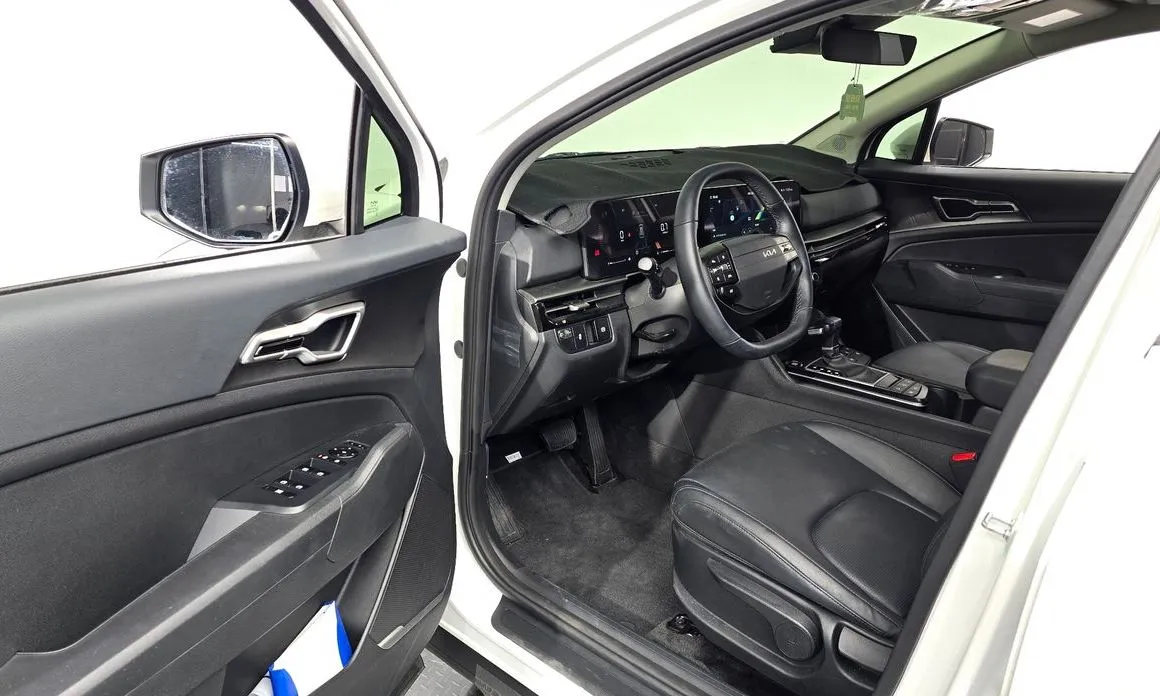 Kia Sportage — фото 10