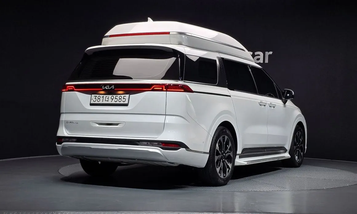 Kia Carnival — фото 10