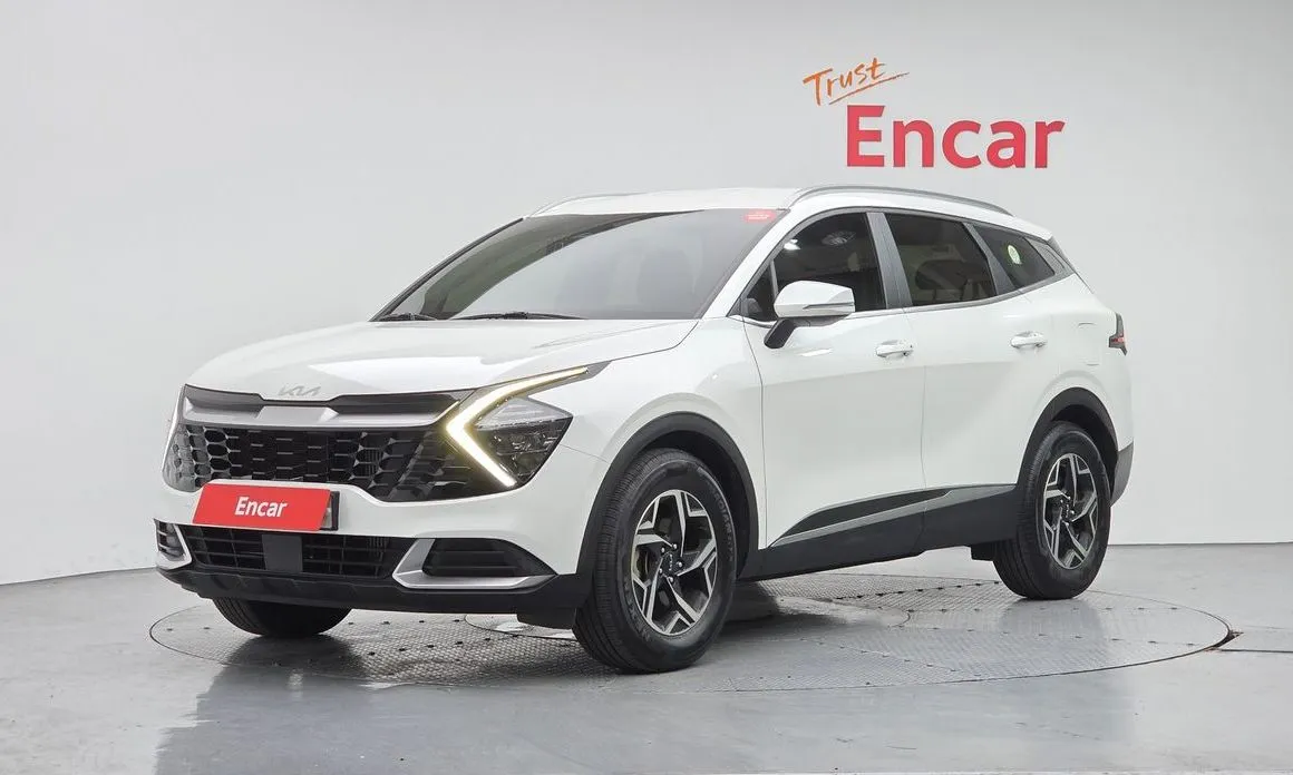 Kia Sportage — фото 1