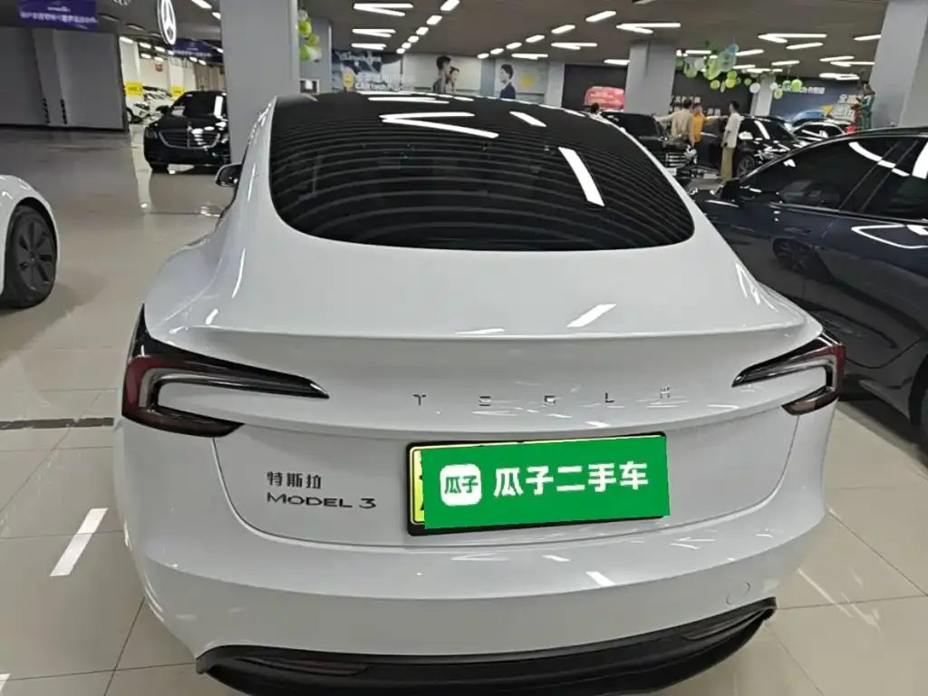 Tesla Model 3 — фото 6