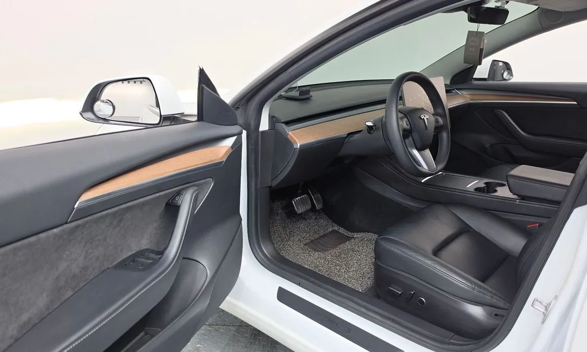 Tesla Model 3 — фото 10