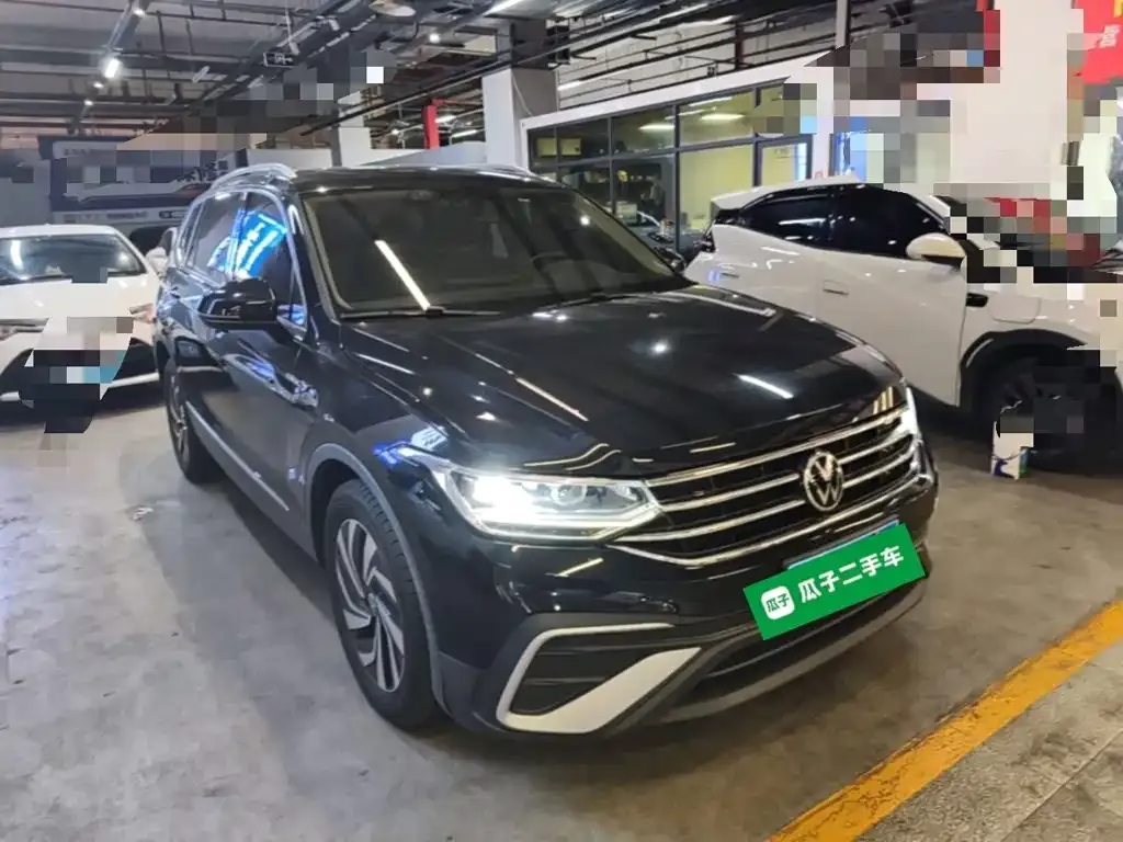 Volkswagen Tiguan L — фото 3