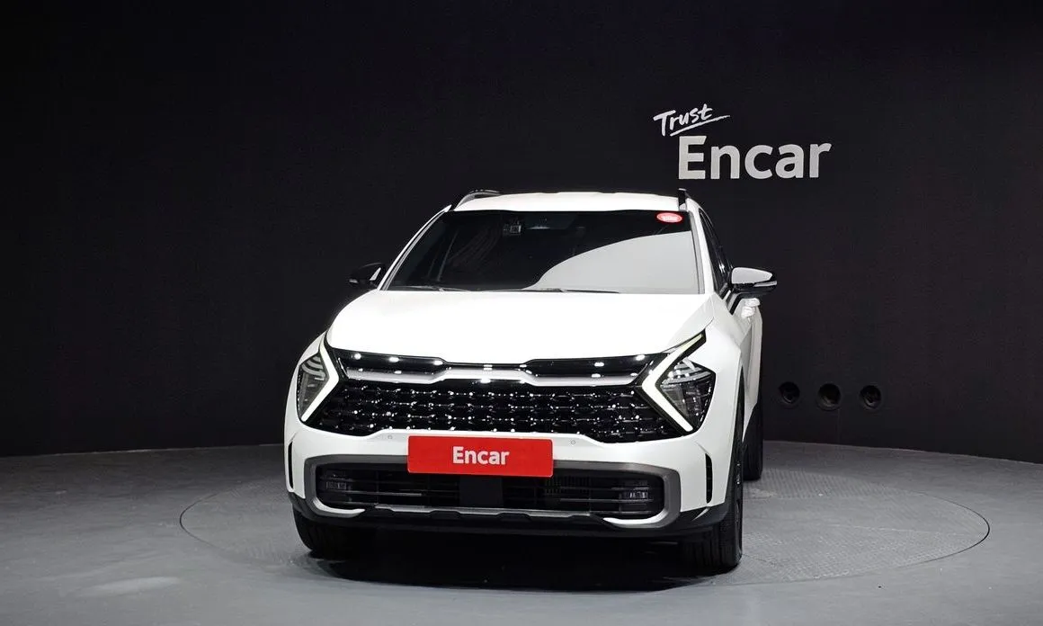 Kia Sportage — фото 7